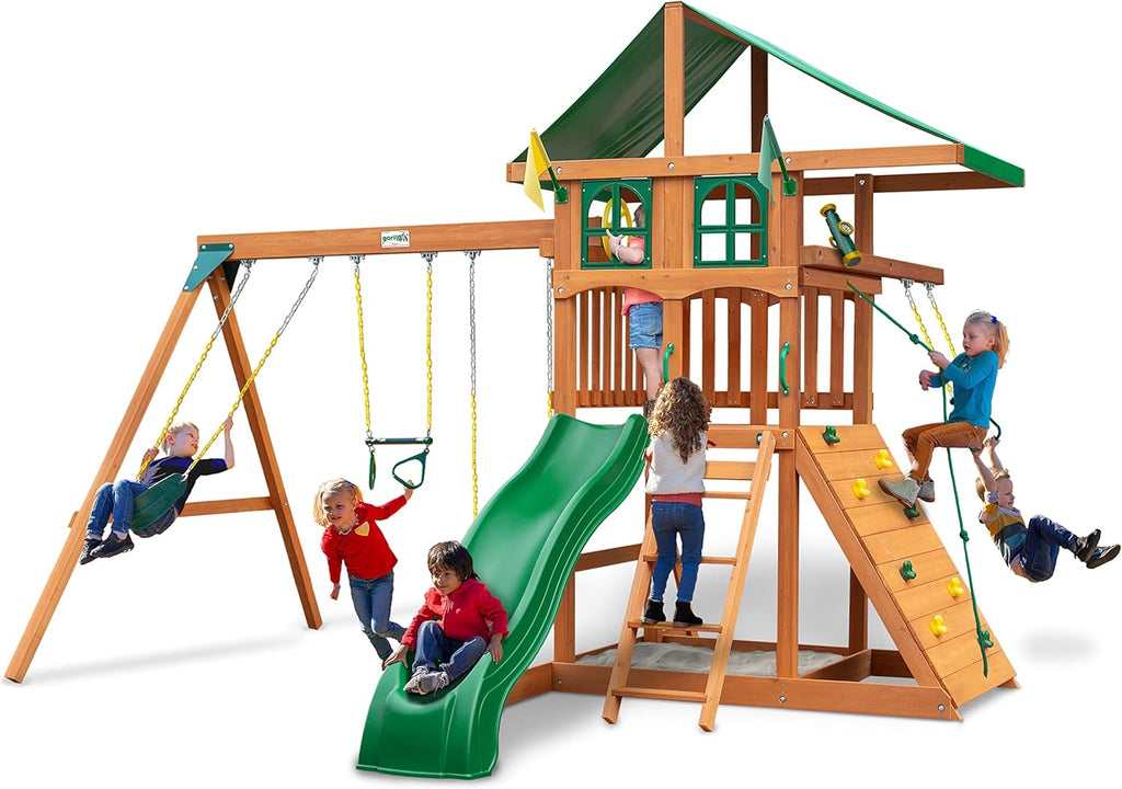 Gorilla Playsets 01-1080 Avalon Treehouse Wooden Swing Set with Oversized Green Vinyl Canopy Roof, Trapeze Arm, Climbing Wall, Ladder, Swings and Slide